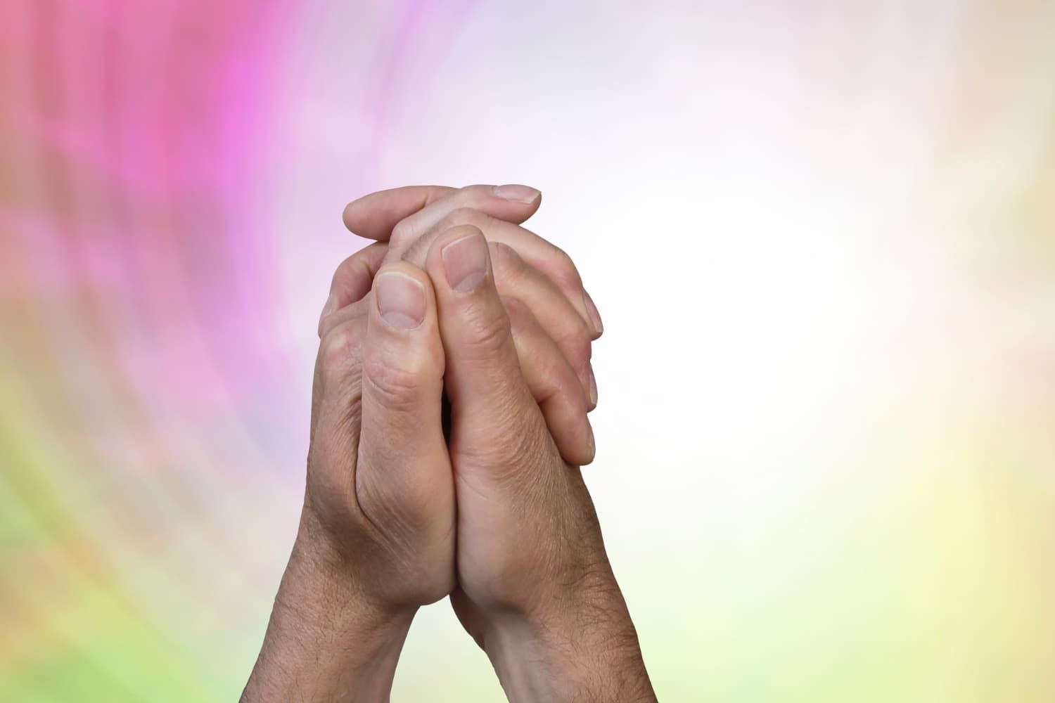 An image of two praying hands that will encourage children to pray and make a connection to God in your children